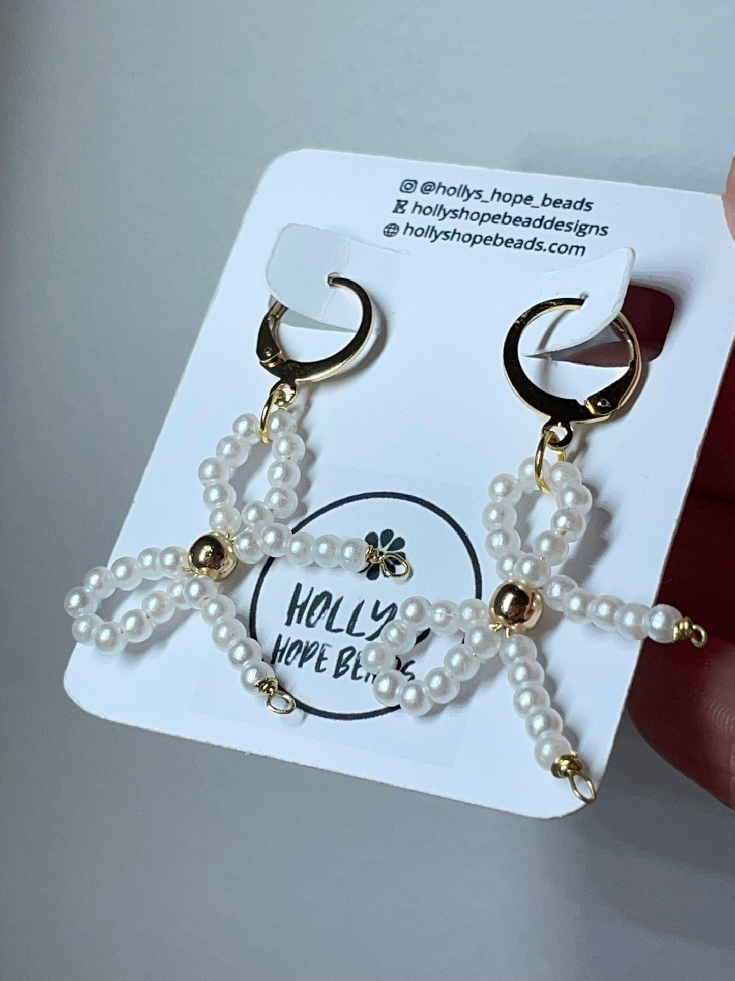 Pearl bow beaded gold huggie hoops