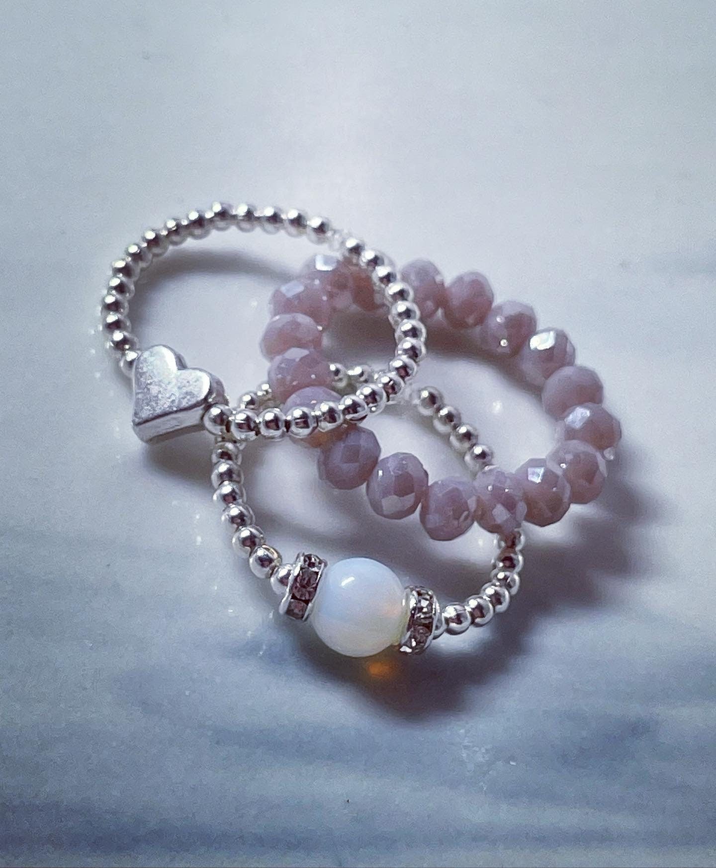 stacking rings Includes opal diamanté ring, czech glass bead ring & silver heart ring