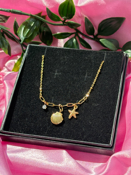 Seashell charm necklace / silver & gold stainless steel / water resistant / tarnish resistant