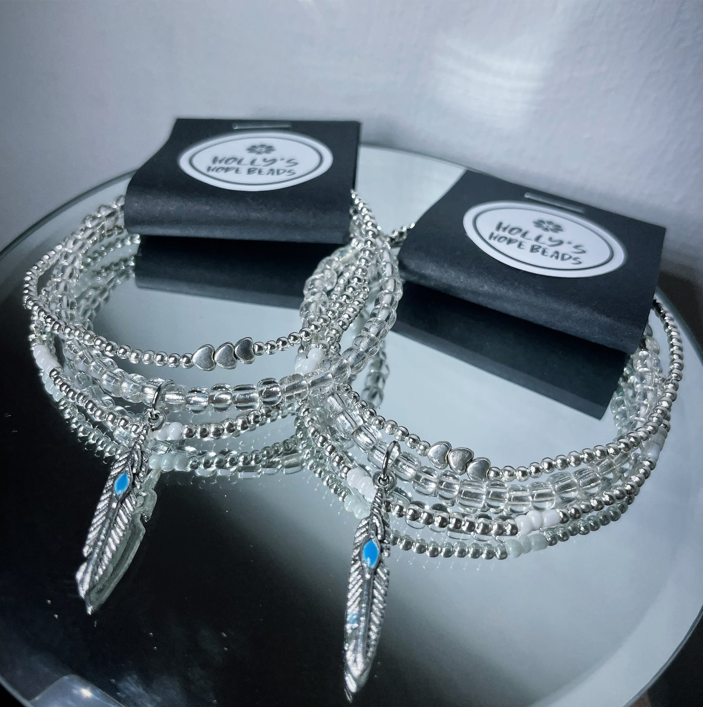 Silver boho feather stack of bracelets