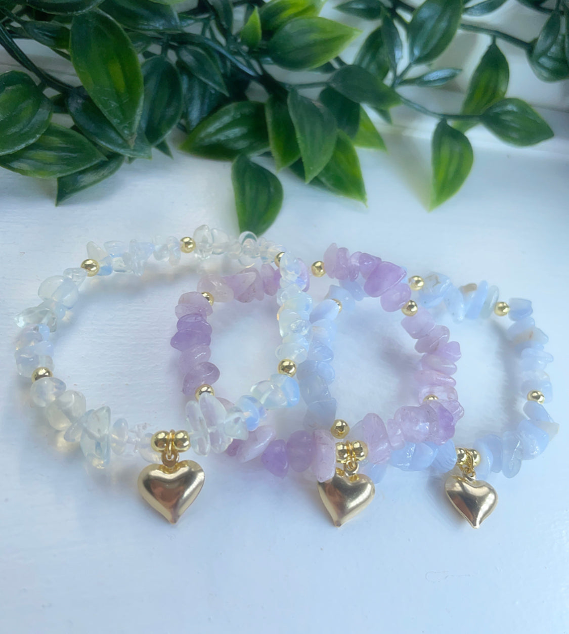Crystal gold heart charm bracelets featuring stunning blue lace agate, opal and lilac amethyst
