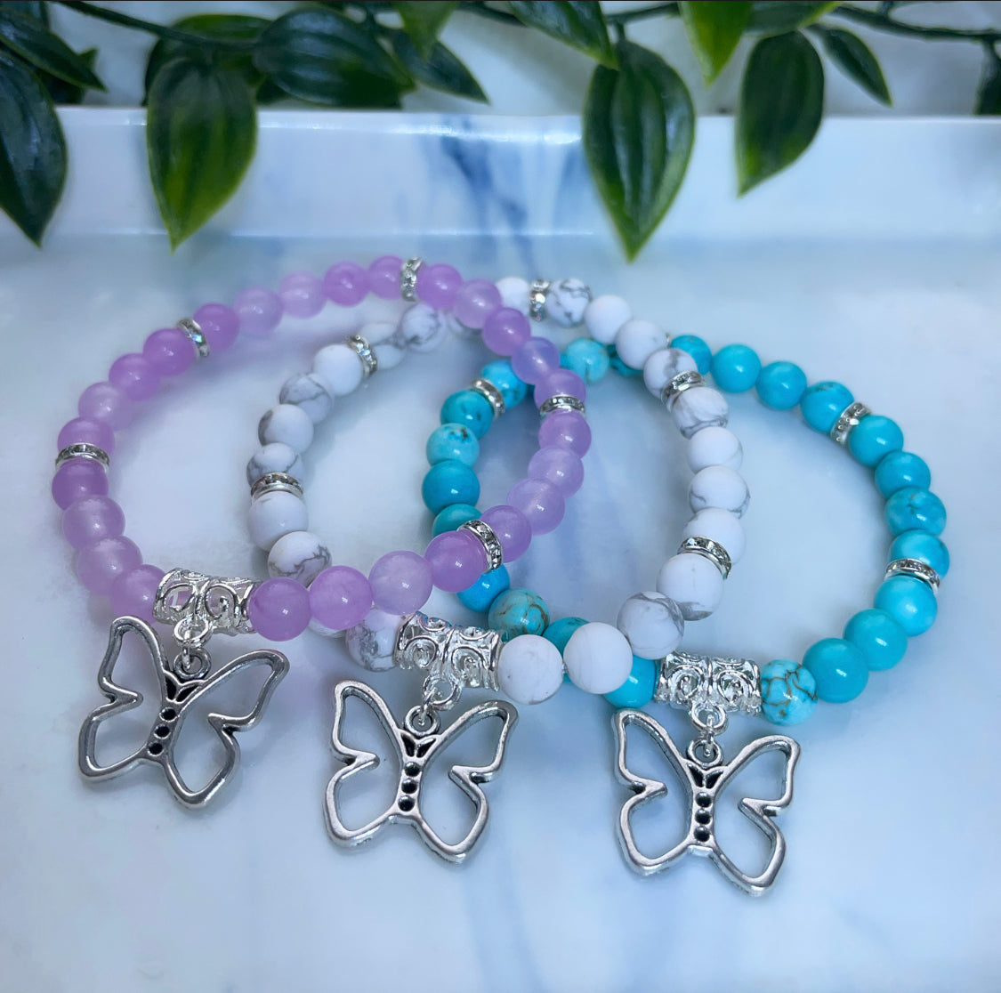 Crystal butterfly charm bracelets lilac jade, howlite and turquoise