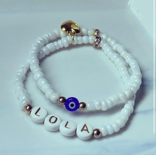 Personalised Pearl white glass bead stacking bracelets with evil eye