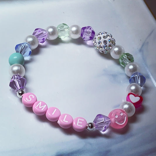 Personalised mix bead bracelet smiley, hearts crystal rondelle and Pearl beads.