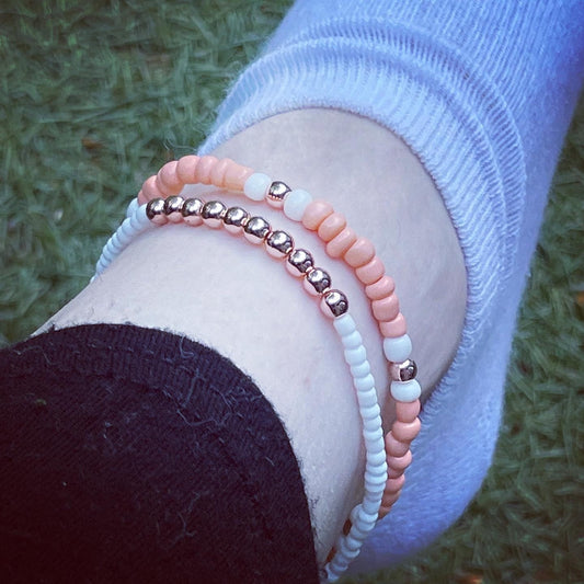Rose gold hematite, peach & white glass bead anklet set
