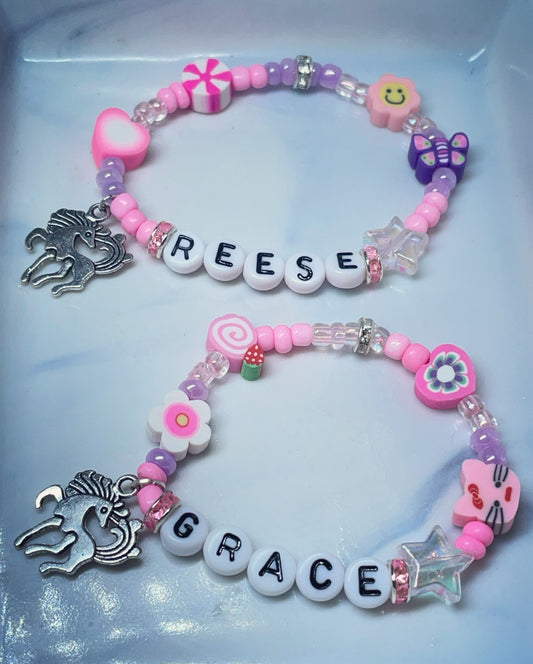 Unicorn girls/children’s personalised bracelets pink/ purples