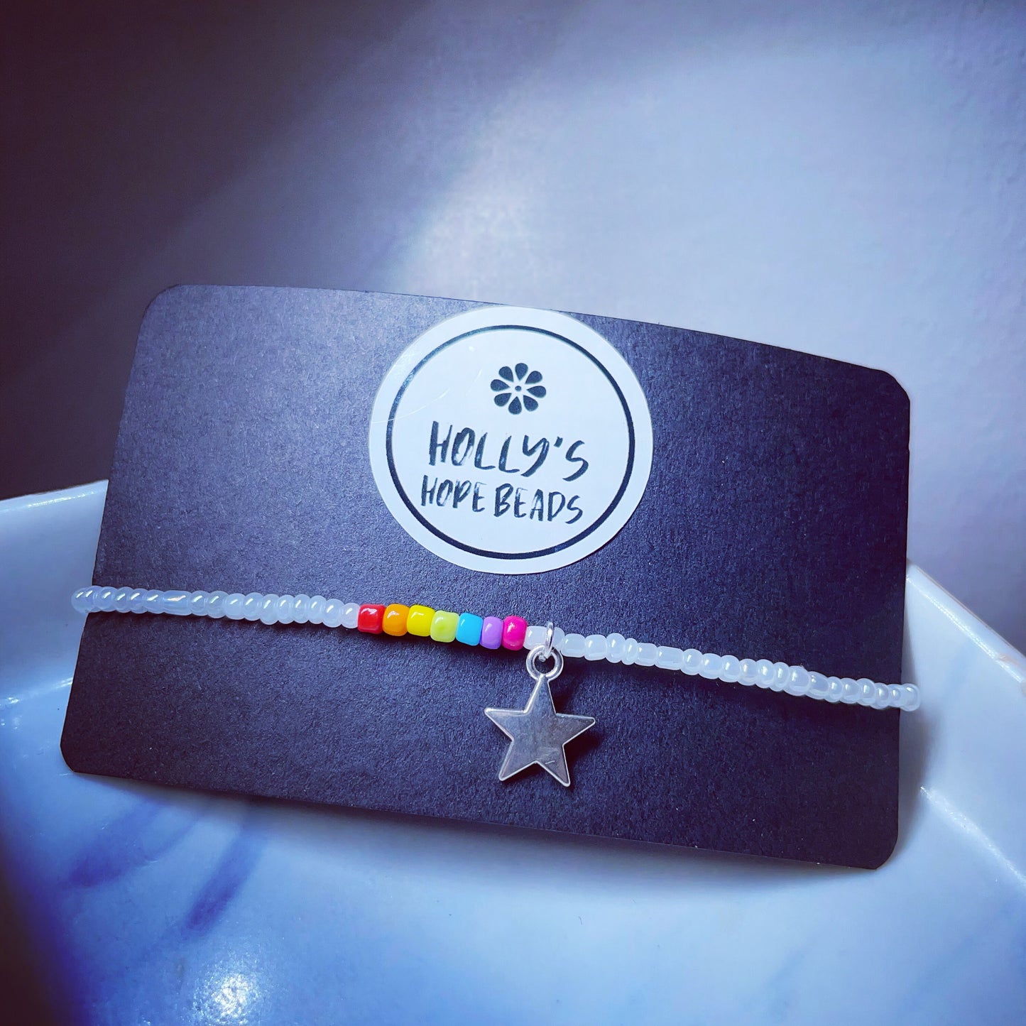 White glass bead rainbow star charm bracelet